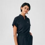 Landau Forward Women's Scrub Dress in Black, stylish and functional healthcare uniform. - view 2
